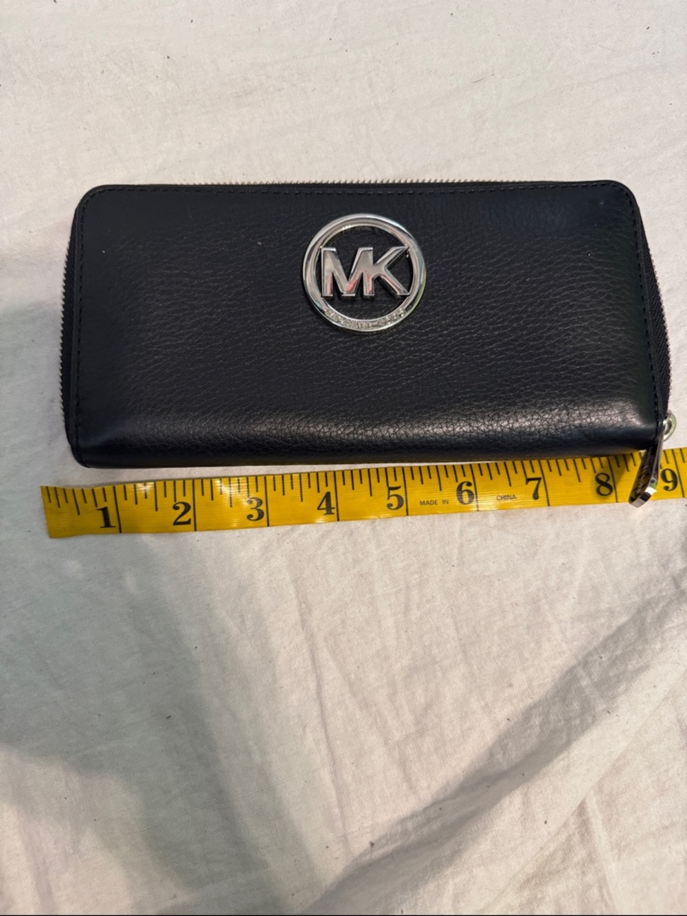 Michael Kors Black Leather Zip-Around Wallet with Silver MK Emblem